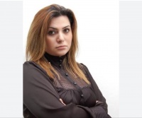 &ldquo;Biri ikisində&rdquo; G&uuml;n Ay &Uuml;midin şeirləri ilə