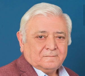 Gülüş günündə dünyaya gələn gülümsər insan - Aqil Abbas