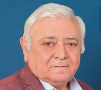 Gülüş günündə dünyaya gələn gülümsər insan - Aqil Abbas